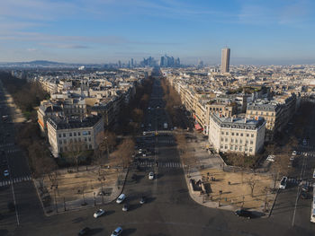 High angle view of cityscape against blue sky