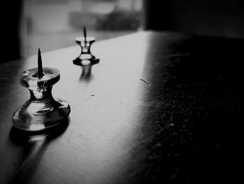 Close-up of lamp on table at home