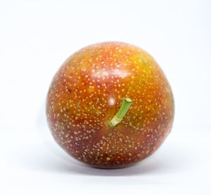 Close-up of apple against white background