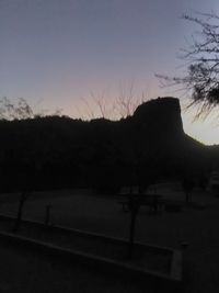 Scenic view of silhouette landscape against sky during sunset