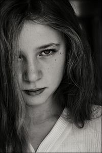 Close-up portrait of serious teenage girl