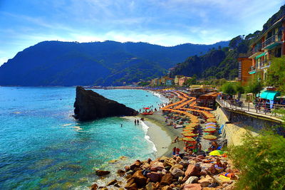Scenic view of sea with mountain in background