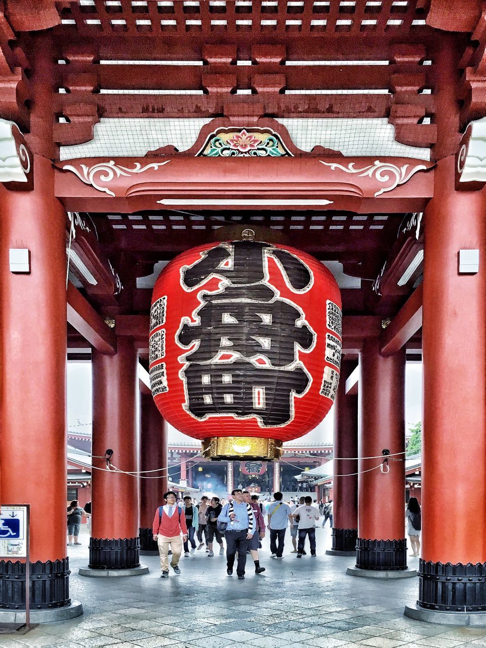 GROUP OF PEOPLE IN A TEMPLE