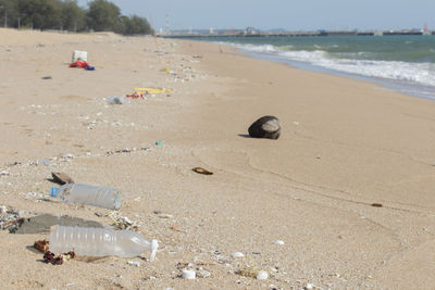 Garbage on sand at beach