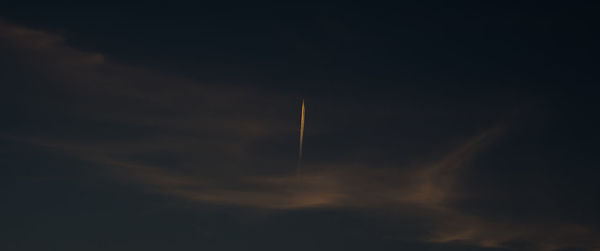 Low angle view of vapor trails in sky