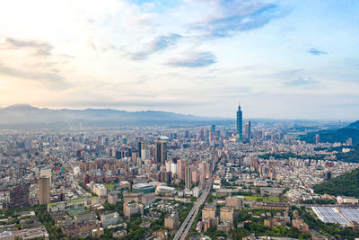 High angle view of buildings against sky in city