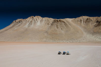 Scenic view of desert against clear sky