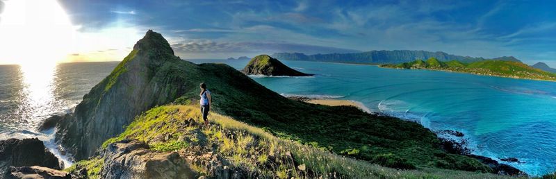 Panoramic view of bay against sky