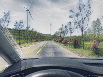 Road seen through car windshield