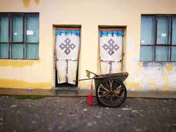 Bicycles parked against window