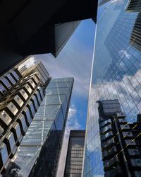 Low angle view of modern buildings against sky