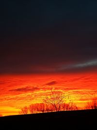 Scenic view of dramatic sky during sunset