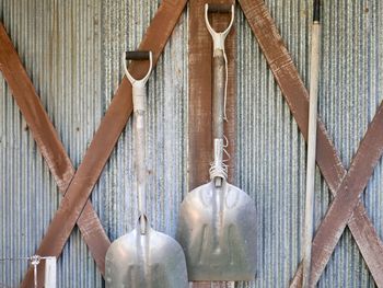 Close-up of clothes hanging on wood