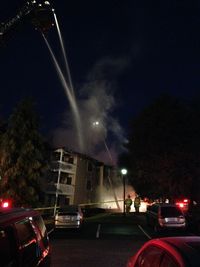 Cars on road at night