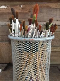 Close-up of paintbrushes on table