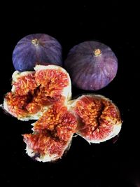 Close-up of food over black background