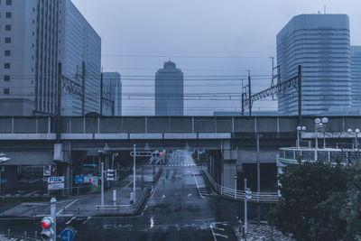 City street and modern buildings against sky