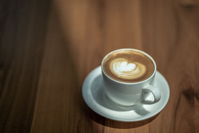 Coffee cup on table