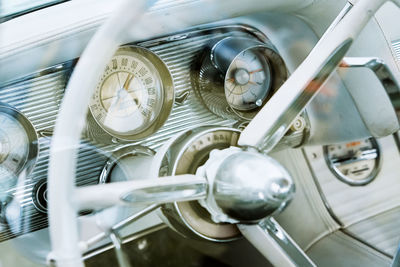 Retro car dashboard with srteering wheel