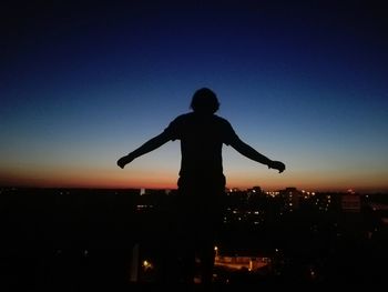 Silhouette of man at sunset