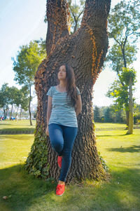 Full length of young woman in park