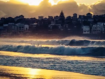 Scenic view of sea at sunset