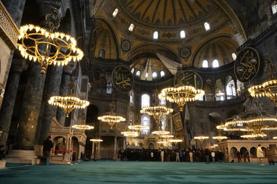 Low angle view of illuminated chandelier