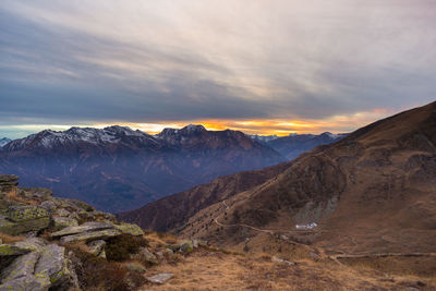 Scenic view of mountains against sky during sunset