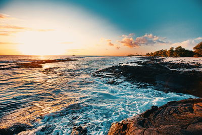 Scenic view of sea against sky during sunset