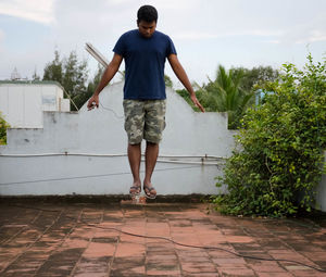 Full length rear view of a boy