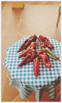 High angle view of red chili on table