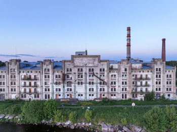 Old abandoned building in riga by the docks.