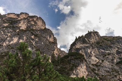 Low angle view of rocks against sky