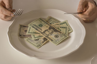 Close-up of hand holding ice cream