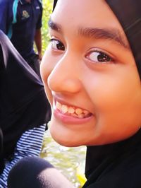 Close-up portrait of smiling boy