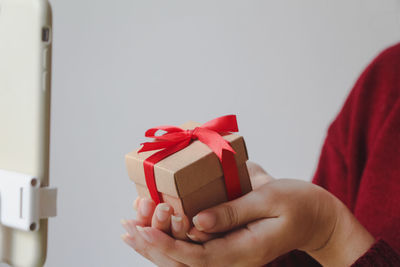 Cropped hand of woman holding toy blocks