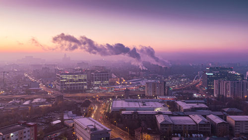 High angle view of townscape against sky during sunrise