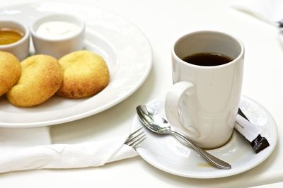 Close-up of coffee cup on table