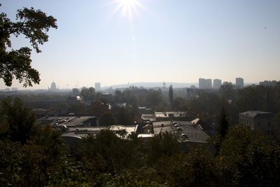 Sun shining through buildings