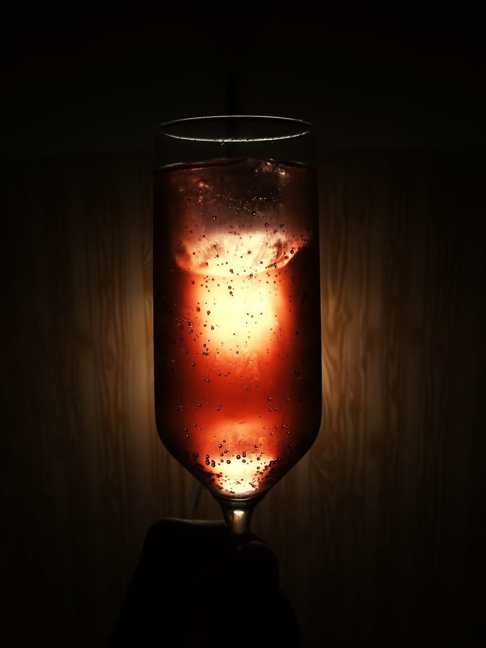 CLOSE-UP OF WINE GLASS ON TABLE