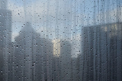 Close-up of water drops on glass