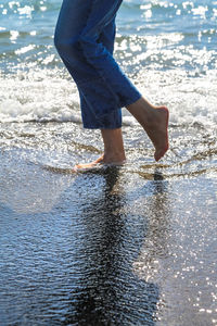 Low section of man on beach