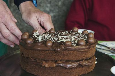 Close-up of man holding ice cream