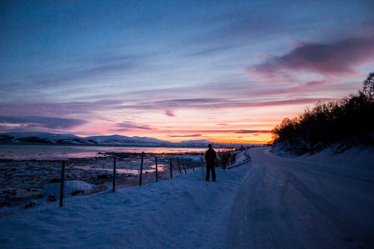 snow, winter, cold temperature, season, weather, sky, sunset, the way forward, walking, rear view, cloud - sky, full length, transportation, covering, road, landscape, tranquil scene, nature