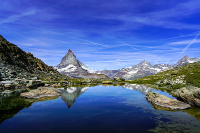 Beautiful reflection of the mattarhorn in the small lake riffelsee.