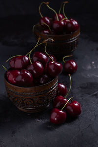 High angle view of cherries in bowl on table