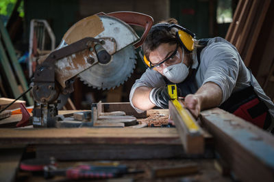 Carpenter working in workshop