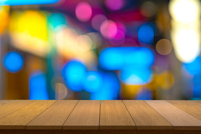 Close-up of illuminated lights on table