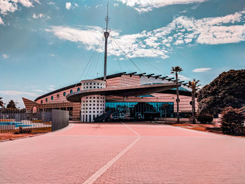 View of building against cloudy sky