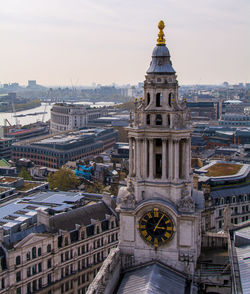 High angle view of buildings in city against sky london uk